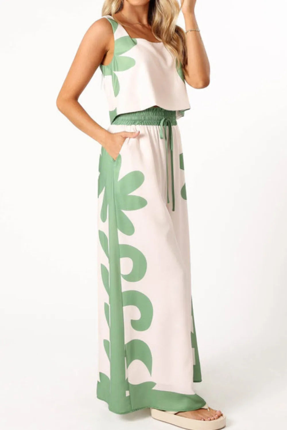 Sleeveless top and wide-leg pants with green leaf patterns