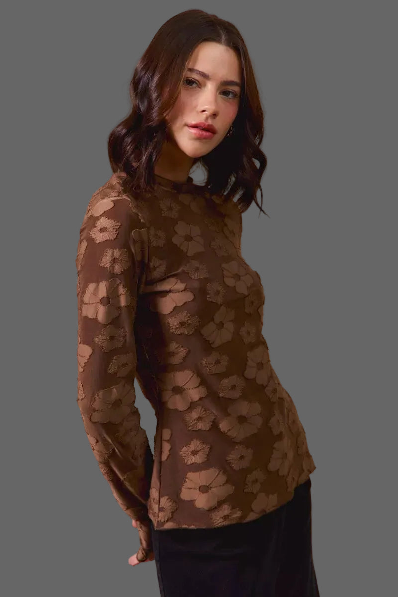 These casual tops are crafted from a stretchy jacquard fabric that offers both comfort and style. The thumb openings add a trendy and practical detail, perfect for keeping your hands warm on chilly days.