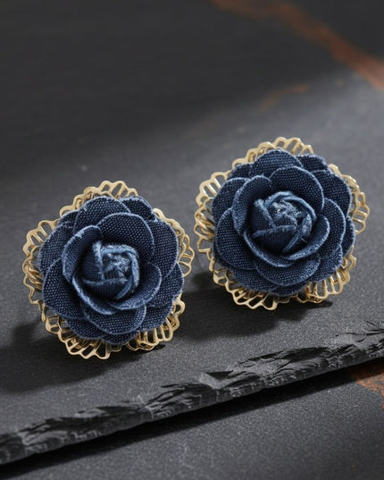Women's Stud Earrings. Chic Stud Flower Earrings Featuring Die-Cut Gold Metal Layered Petals with Blue Denim Dimensional Rose. Playful Floral Boutique Earrings. Post Backing.