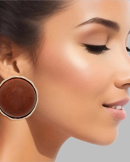Women's Stud Earrings Large Round Gold Metal Studs Featuring Domed Brown Wood Detail. Studs measure 1" tall. 