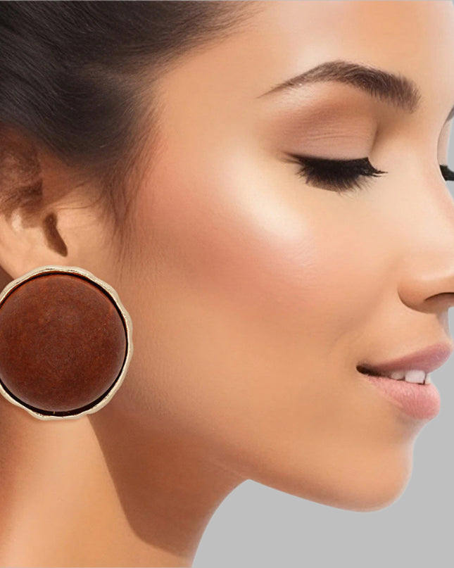 Women's Stud Earrings Large Round Gold Metal Studs Featuring Domed Brown Wood Detail. Studs measure 1" tall. 
