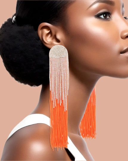 Women's Tassel Earrings Long Shoulder Duster Bright Orange Silky Tassel Earrings Featuring Arched Gold and Pave Clear Rhinestone Vintage Art Deco Top Detail with Rhinestone Fringe. Post Backing.