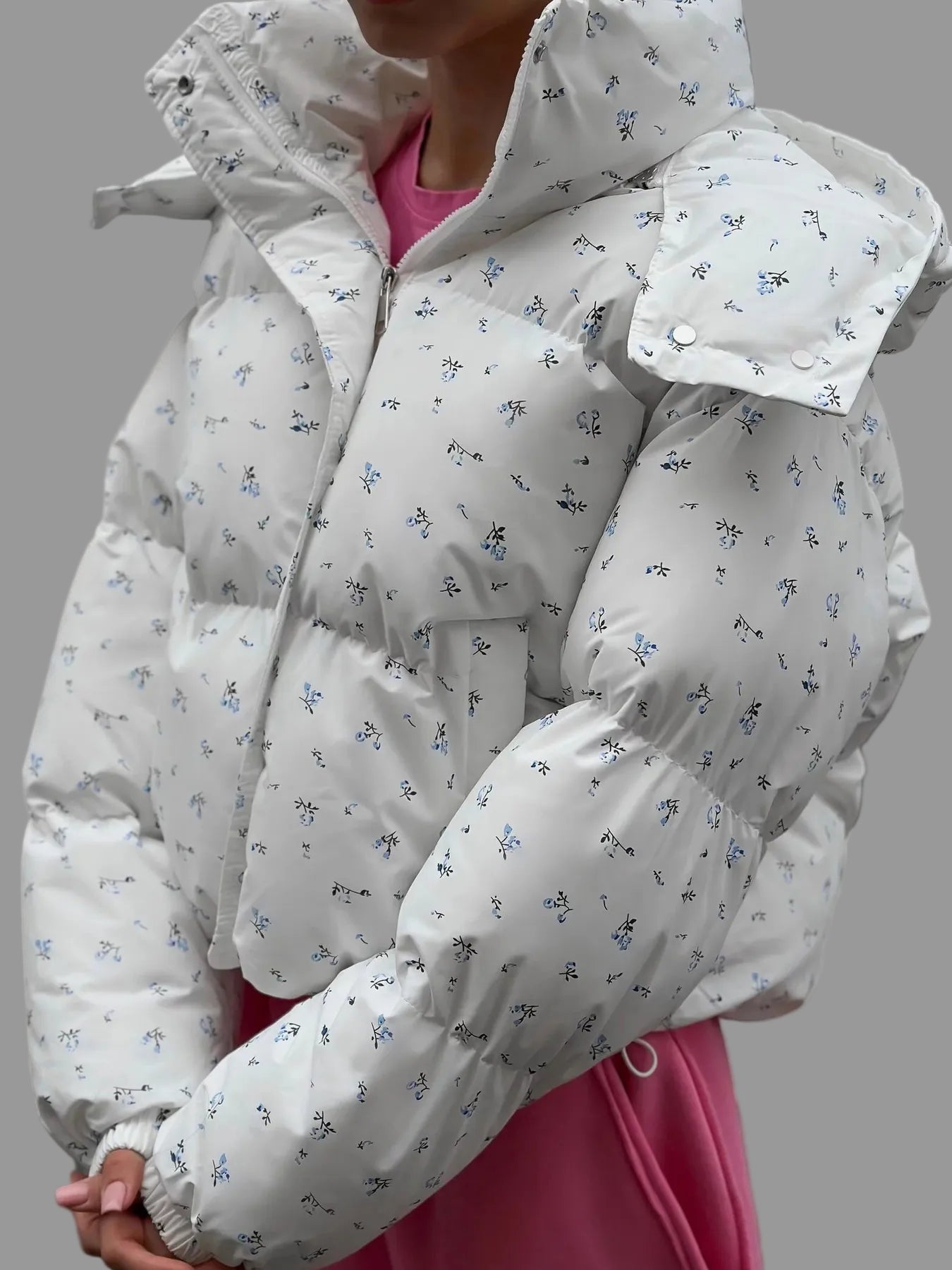 White puffer jacket with floral patterns 