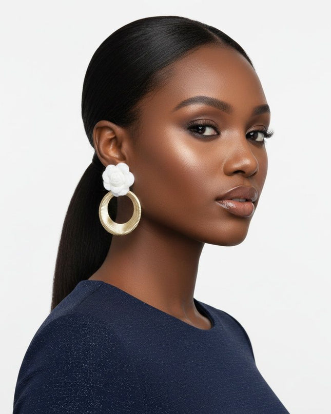 Women's Drop Earrings. Eye-Catching Drop Earrings Featuring a Vibrant White Felt Fabric Rose Flower with Dimensional Petals Paired with a Sleek Gold Metal Ribbed Texture Ring Drop Detail.