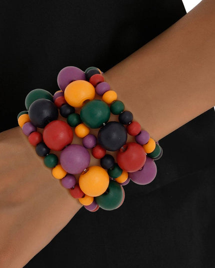 Women's Wood Bead Bracelet Set. Tribal and Earthy Bold Dark Multicolor Wooden Ball Bead 5 Pcs Stretch Bracelet Set Featuring 3 Strands of Small Wood Beads and 2 Strands of Medium Wood Beads.