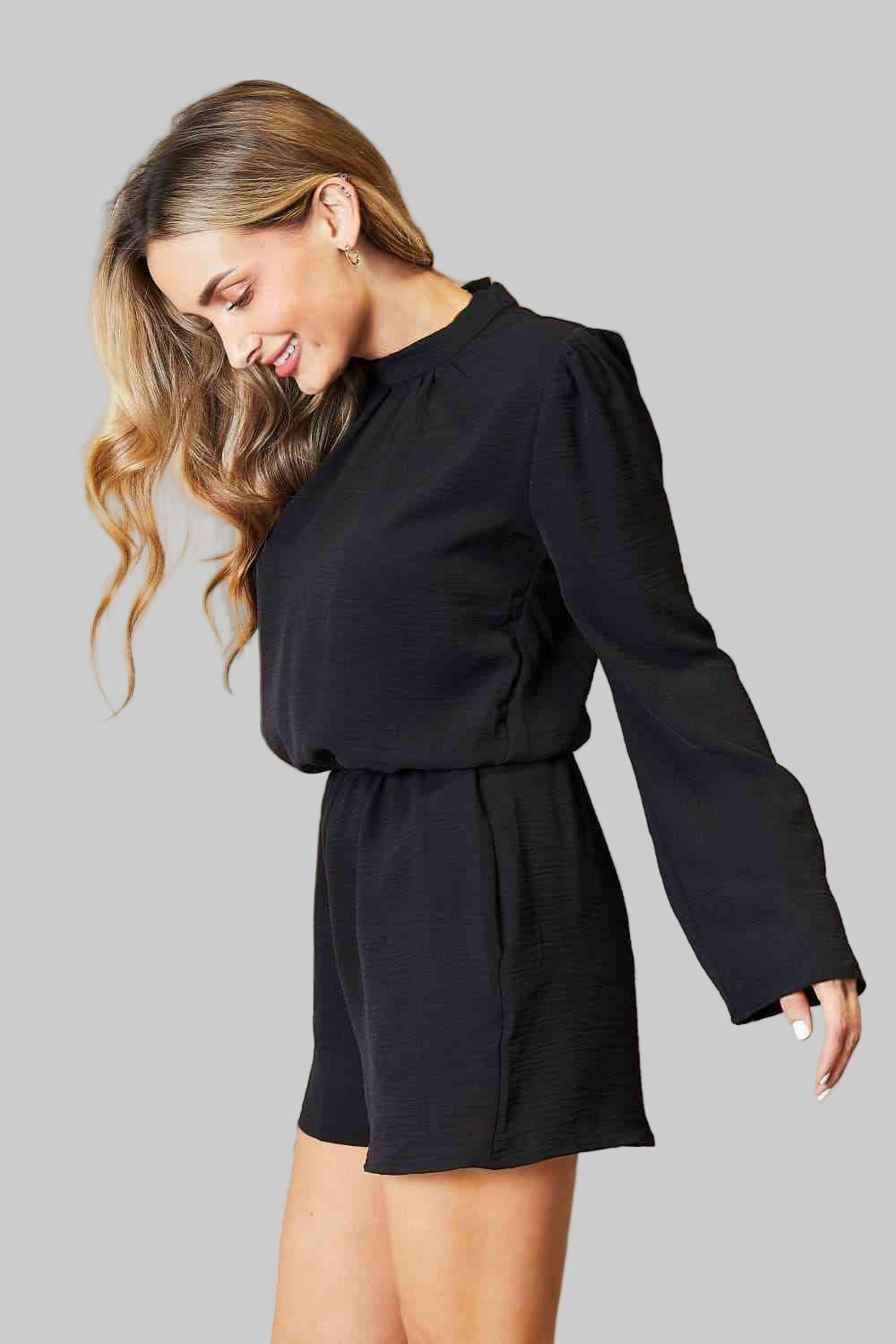 This open-back romper with pockets is the perfect combination of style and functionality.