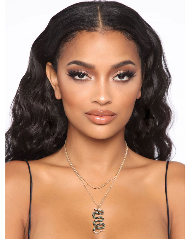 Designer Style Gold Metal Chain Double Layer Necklace Featuring Striped Green Rhinestone Snake Pendant. Pendant measures 1.75 inches long.