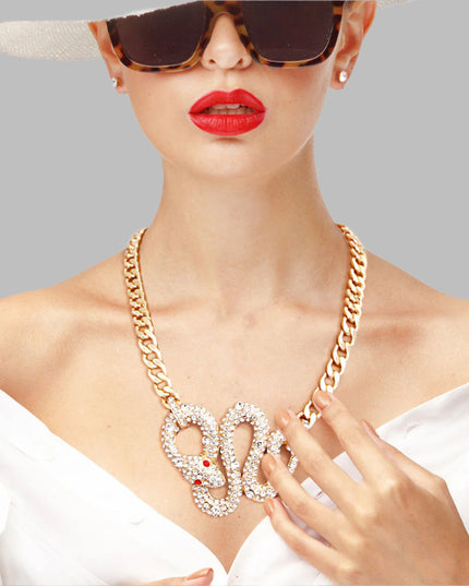 Gold Metal Chain Necklace Set Featuring Rhinestone Cobra Pendant. Pendant measures 3.15 inches wide.