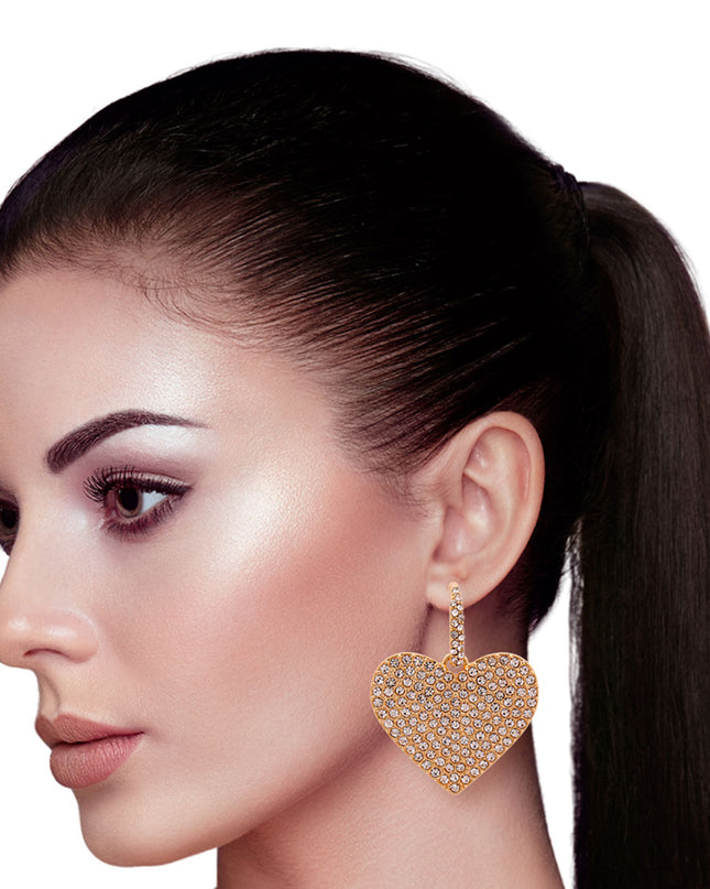 Gold Metal and Clear Crystal Rhinestone Huggie Hoop Earrings Featuring Heart Detail. Earrings measure 1.5 inches wide.