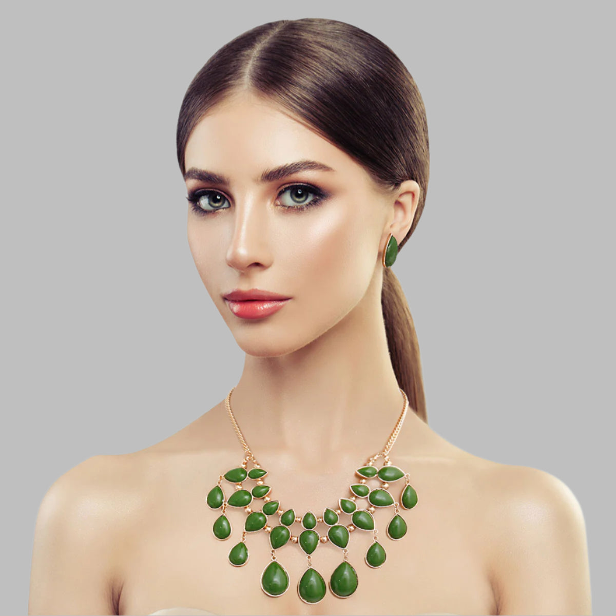  Green bead necklace set featuring vibrant green beads and intricate detailing, complemented by matching earrings for a stylish and timeless look.