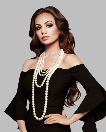 Long 5 Strand Varying Sized Cream Pearl Layered Necklace Set. Necklace measures 24 inches to 54 inches.