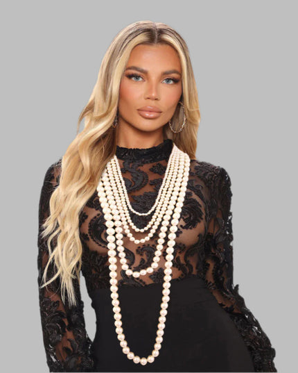 Long 5 Strand Varying Sized Cream Pearl Layered Necklace Set. Necklace measures 24 inches to 54 inches.