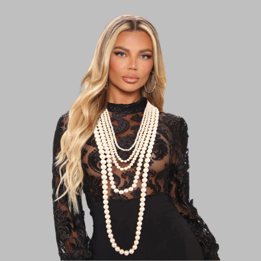 Long 5 Strand Varying Sized Cream Pearl Layered Necklace Set. Necklace measures 24 inches to 54 inches.