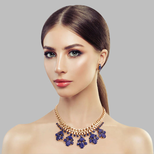 Navy blue bead and gold necklace set featuring elegant beadwork and shimmering gold accents, paired with matching earrings for a sophisticated look.