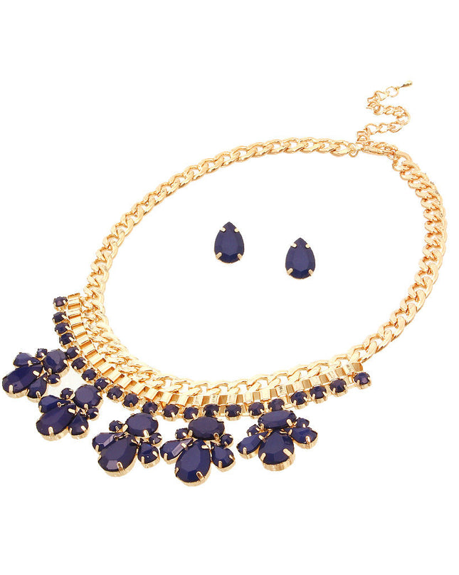 Navy blue bead and gold necklace set featuring elegant beadwork and shimmering gold accents, paired with matching earrings for a sophisticated look.