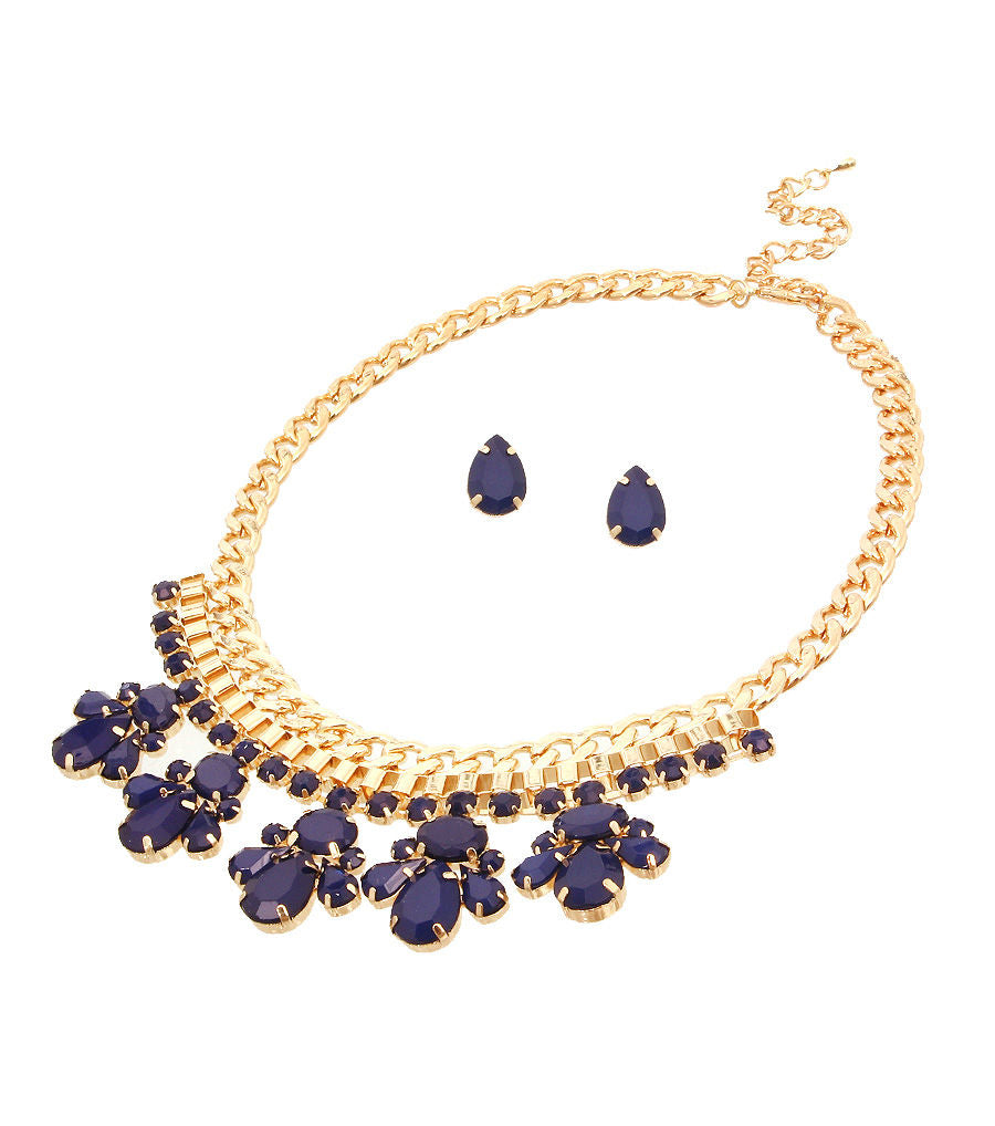 Navy blue bead and gold necklace set featuring elegant beadwork and shimmering gold accents, paired with matching earrings for a sophisticated look.