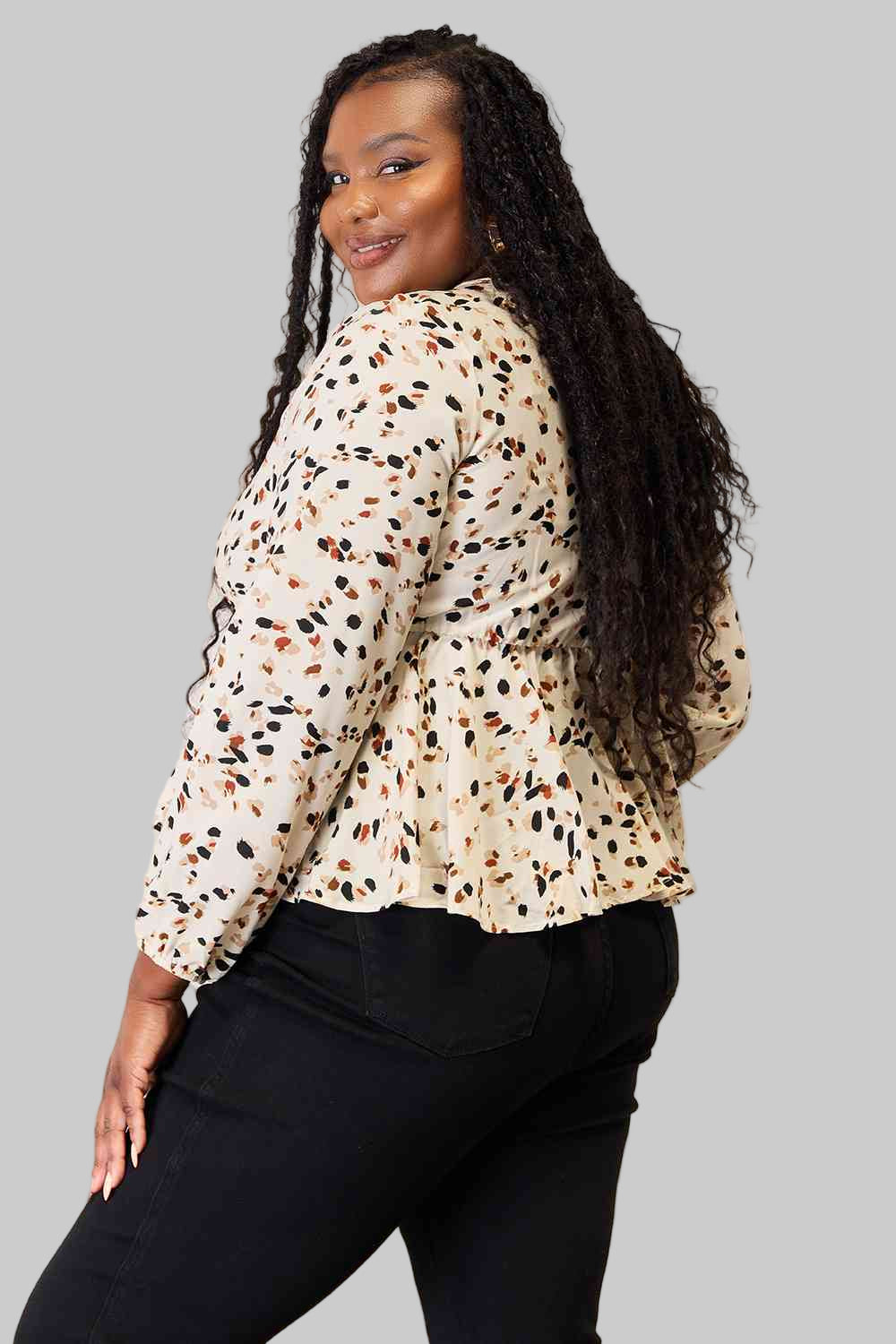 Printed Tied Plunge Peplum Blouse