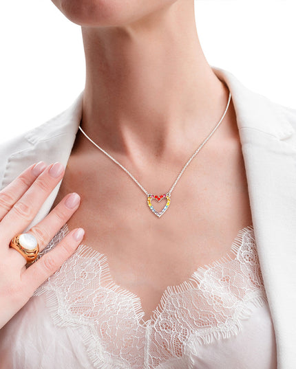 Silver Metal Chain V Necklace Featuring Rainbow Rhinestone Heart Pendant. Pendant measures .55" x .58