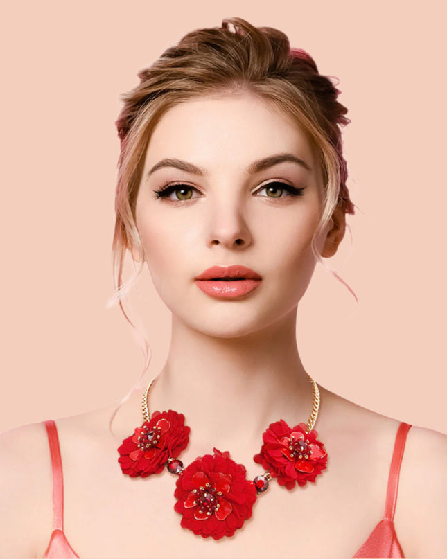 Gold Chain with Red Fabric Flowers Featuring Metal, Bead, and Rhinestone Details. Flowers measure 2 inches.