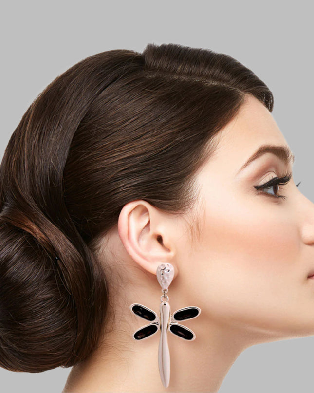 Silver Matte Metal Drop Dragonfly Earrings Featuring Black Diamond Crystal Wings. Earrings measure 1.5 inches wide.