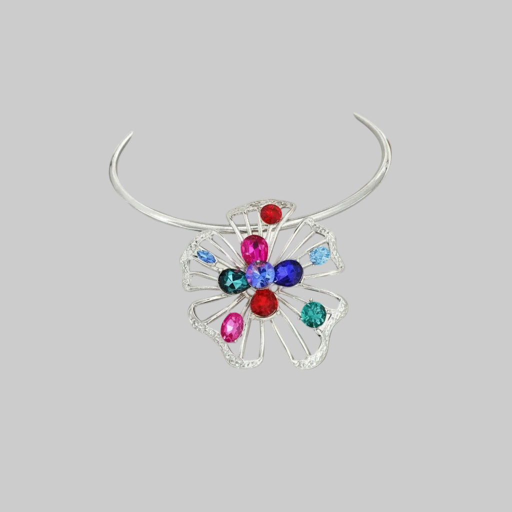 A silver multi-colored floral necklace with rhinestone embellishments.