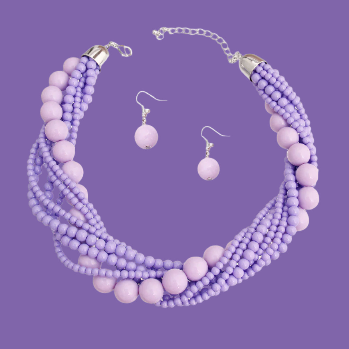 Silver and Varying Sized Lavender Beads Multi Strand Twisted Necklace Set. Weighs .14 lbs